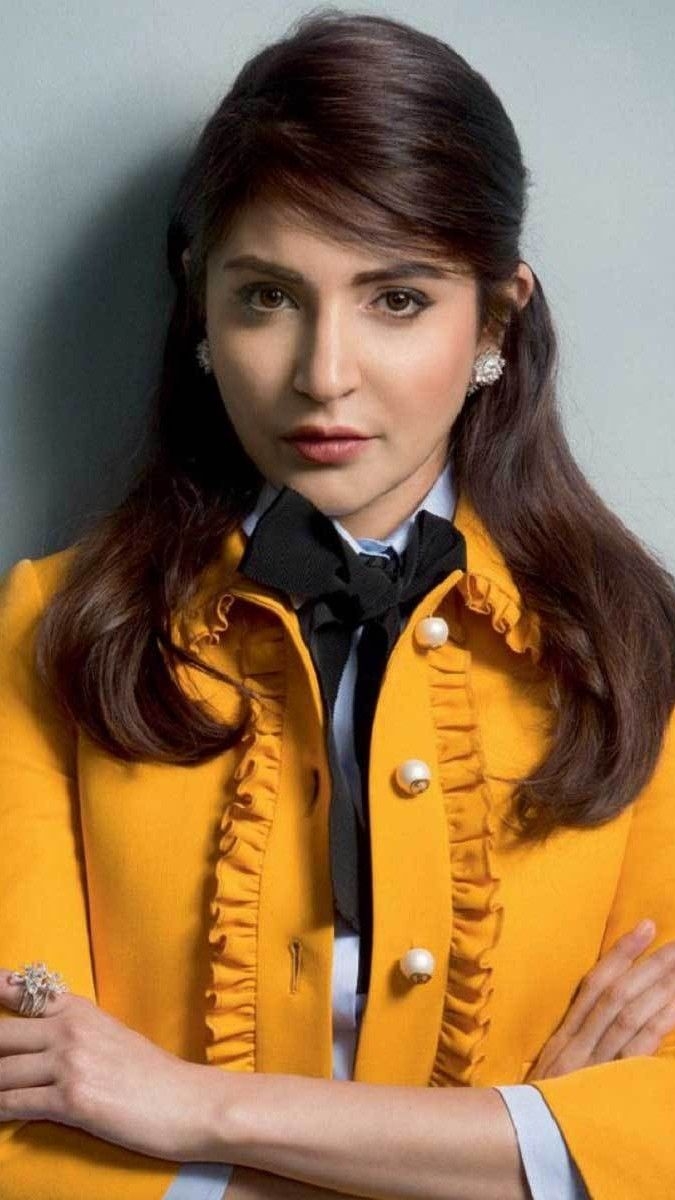 680x1200 Anushka Sharma dashing in yellow jacket glamour mobile wallpaper, Phone