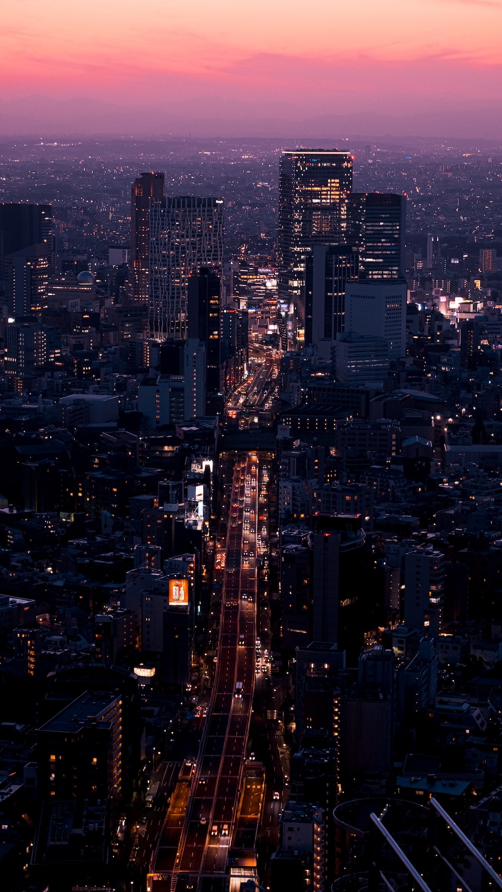 1000x1780 Aerial view of city buildings during night time photo, Phone