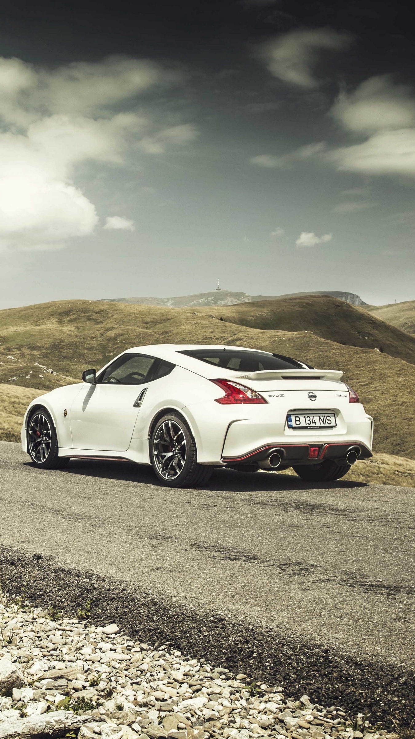 1350x2400 Download wallpaper  nissan, 370z, road, white, side view, Phone