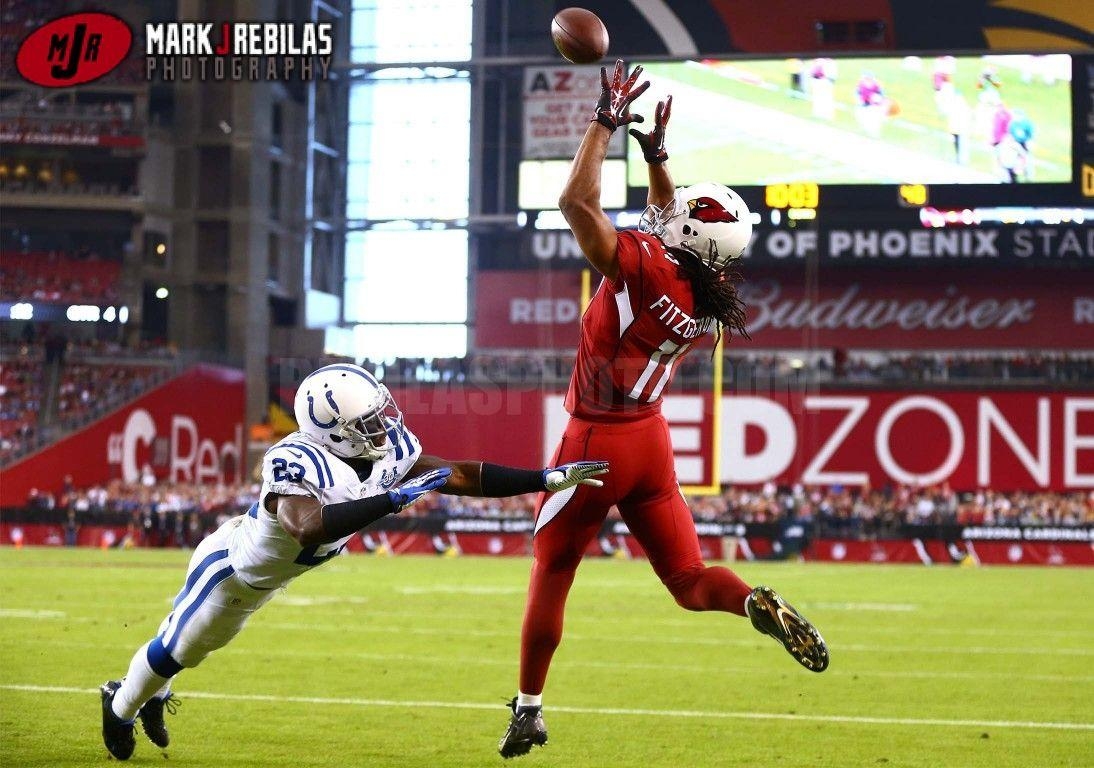 1100x770 Best of 2013: Best Football Photo on Mark J. Rebilas Blog, Desktop