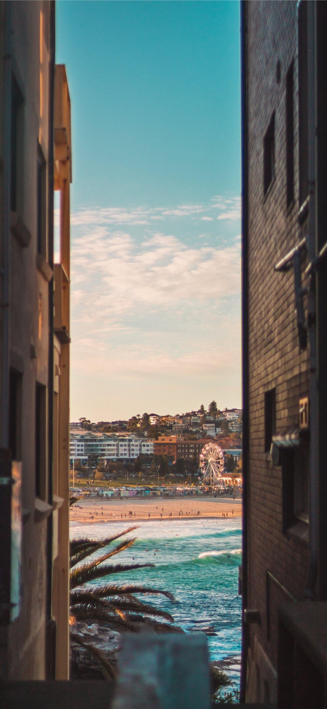 1130x2440 Bondi beach between two houses iPhone 8 Wallpaper Download. iPhone, Phone