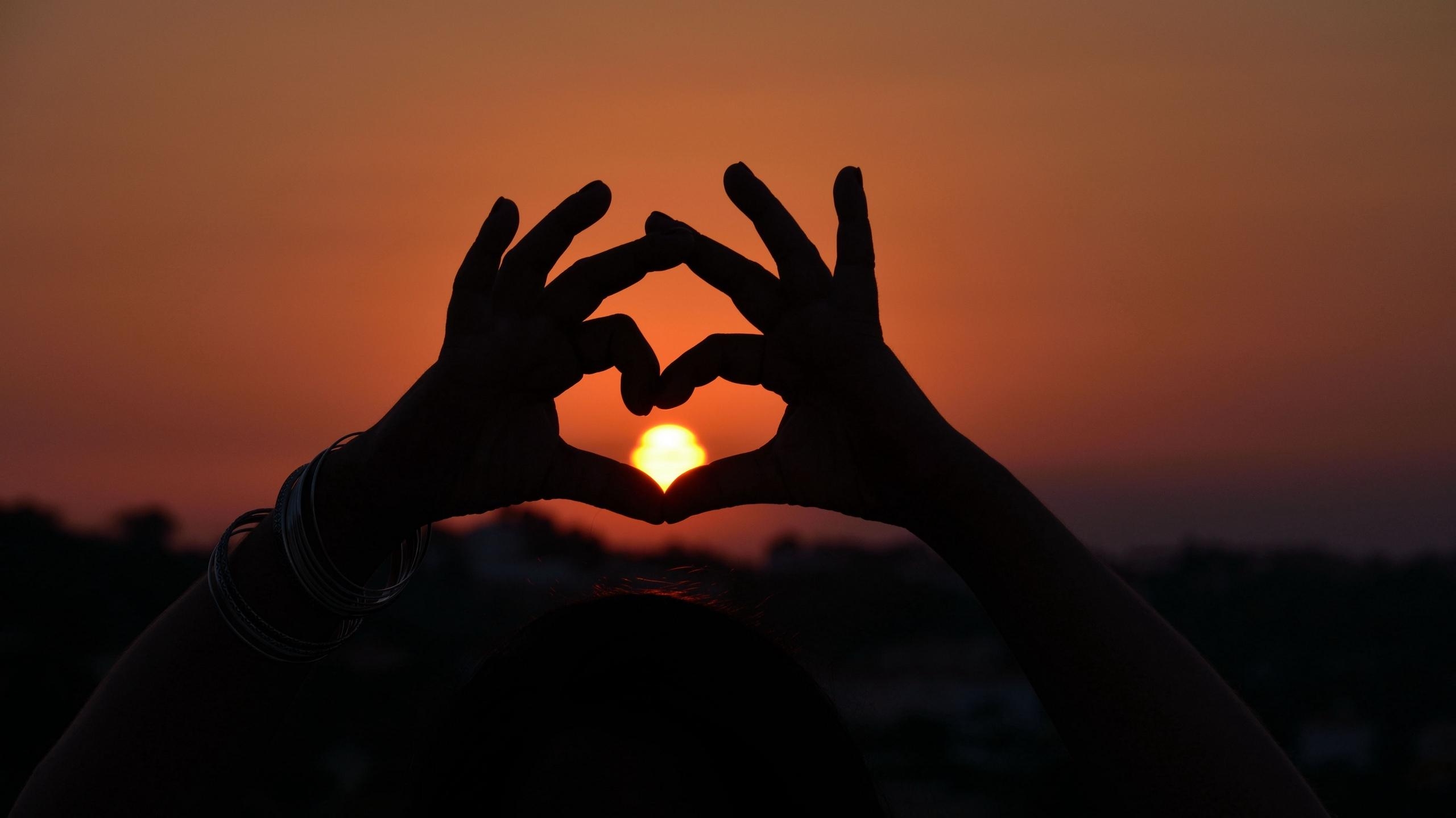 2560x1440 Download wallpaper  heart, hands, sunset, love, sun, Desktop