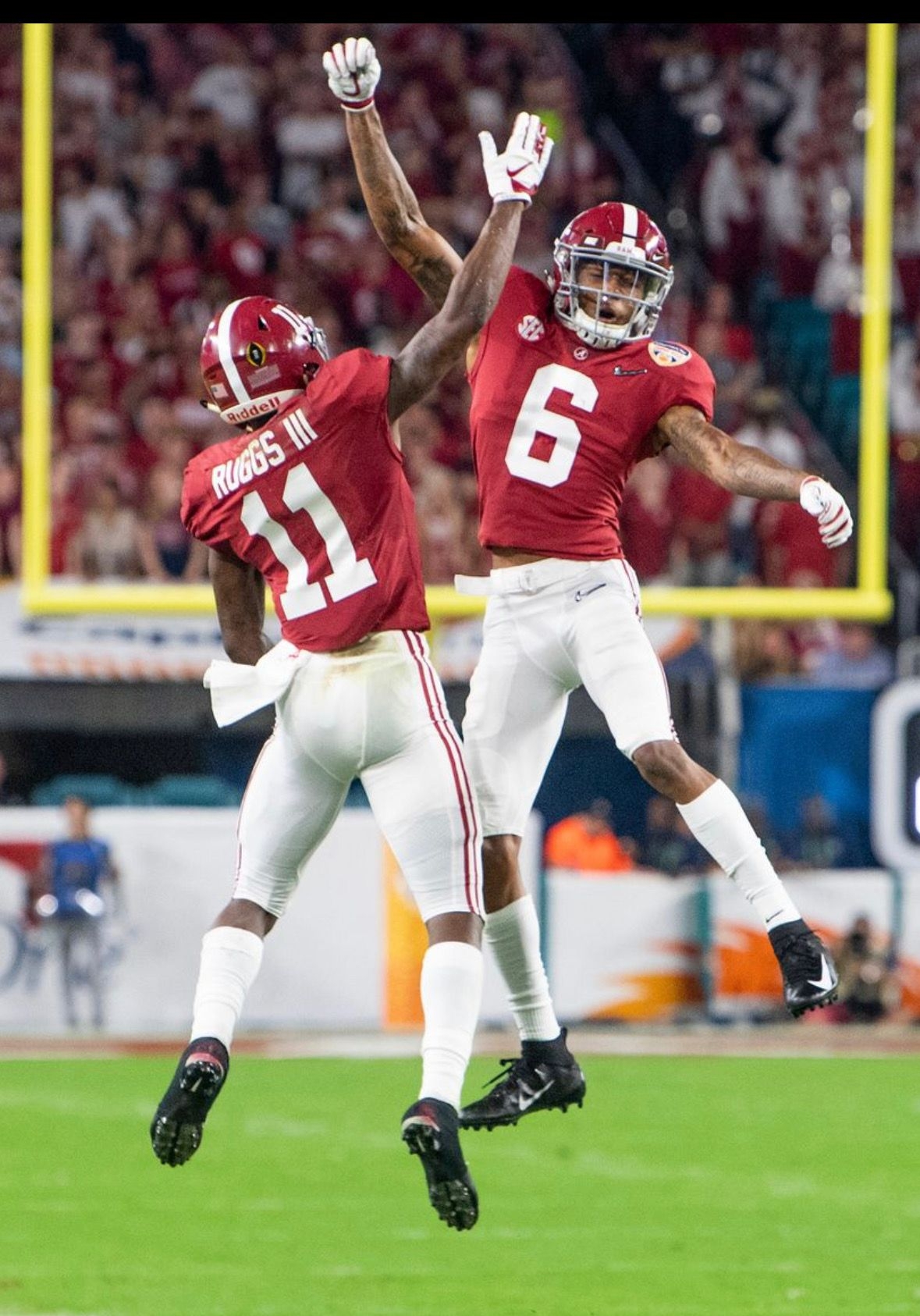 1180x1690 Alabama wide receivers Henry Ruggs, III, (11) and DeVonta Smith (6) celebrate Ruggs' touchdown catch in. Alabama crimson tide football, Alabama football, Alabama, Phone