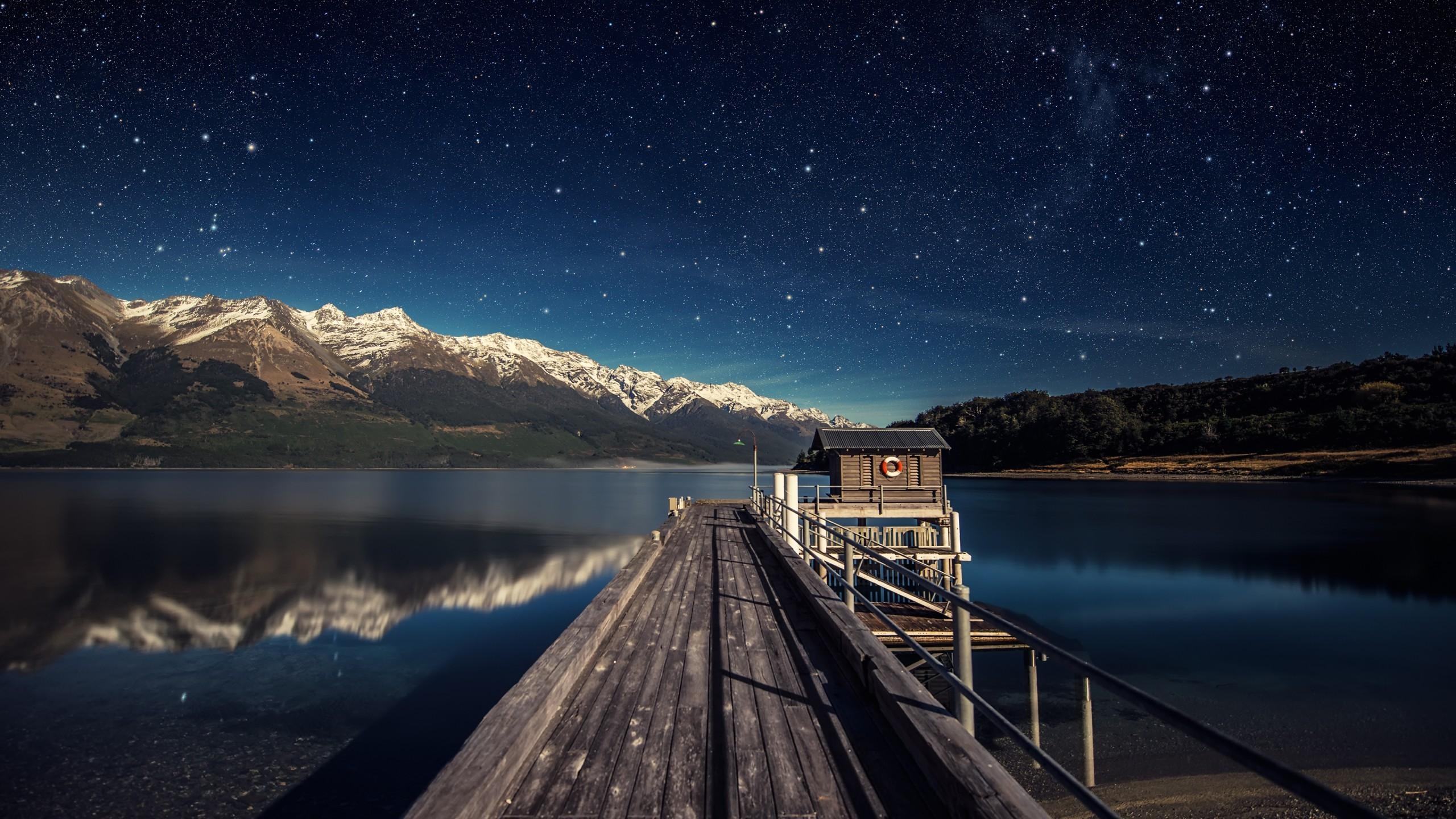 2560x1440 Wallpaper night sky, 5k, 4k wallpaper, stars, mountains, bridge, New Zealand, OS, Desktop