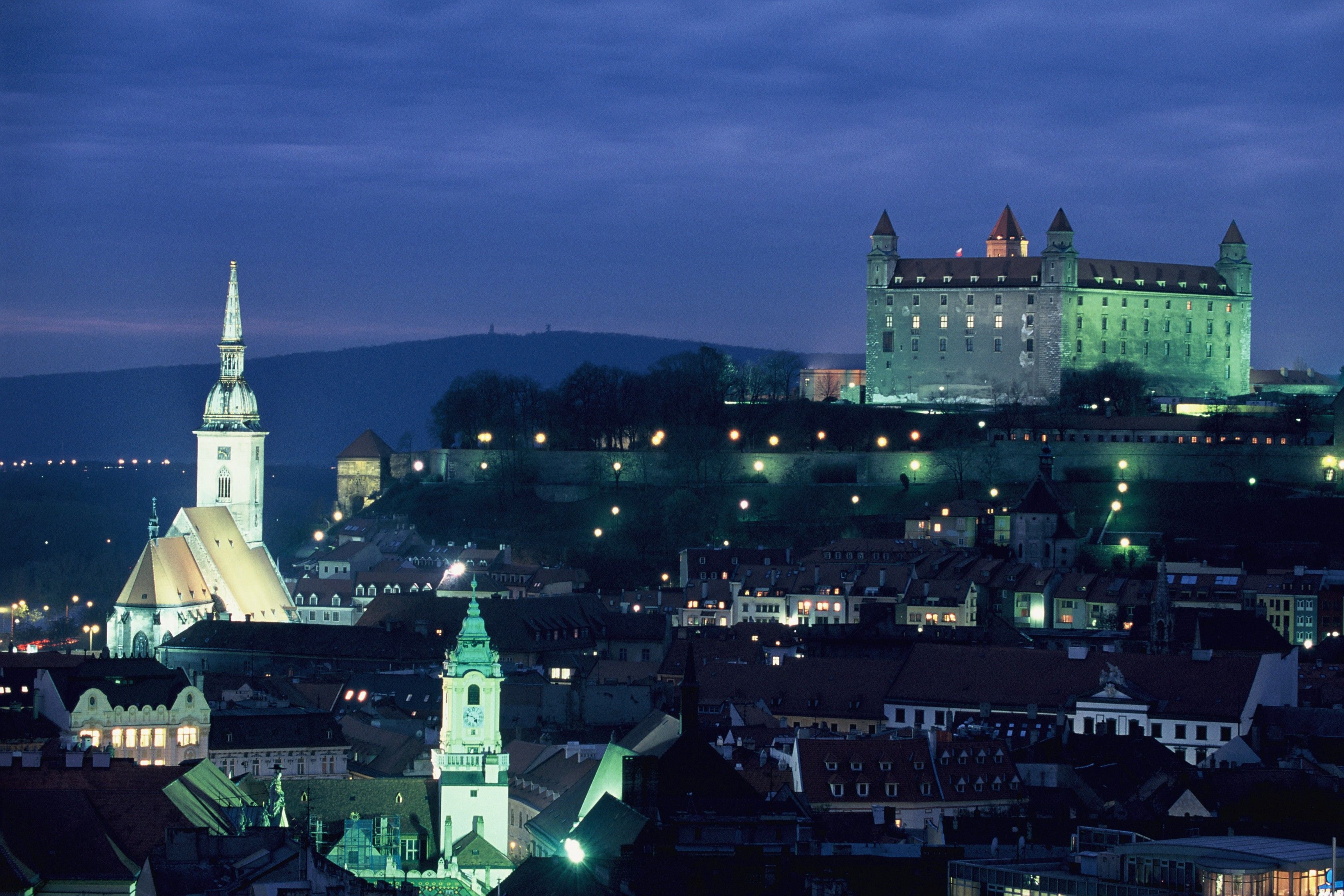 3360x2240 cityscapes, night, lights, hills, buildings, Slovakia, capital, Desktop