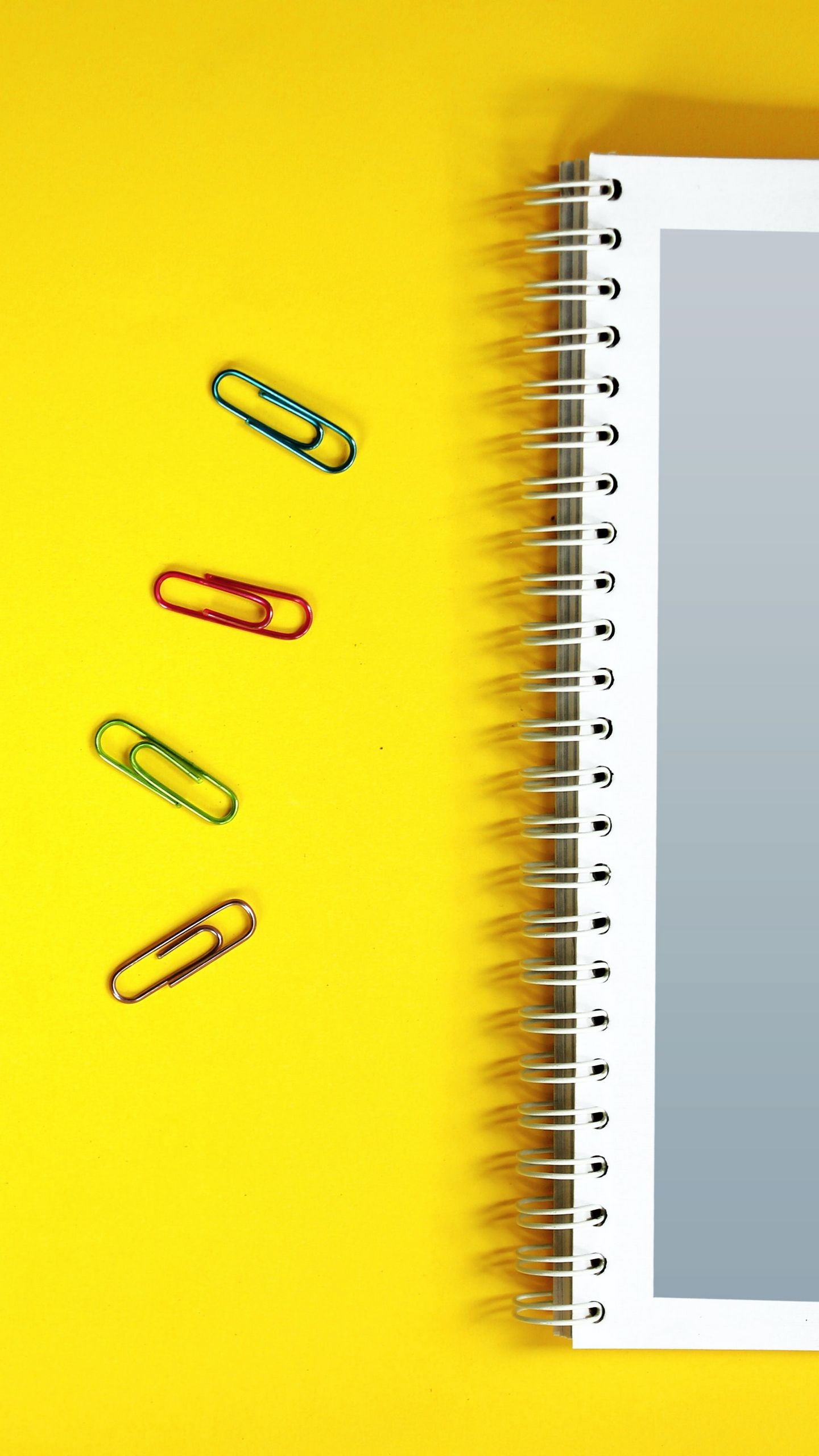 1440x2560 Download wallpaper  notebook, paper clips, surface, yellow qhd samsung galaxy s s edge, note, lg g4 HD background, Phone