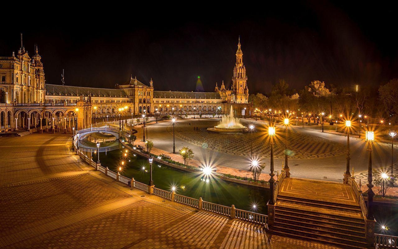 1280x800 Picture Spain Seville Street night time Street lights Cities, Desktop