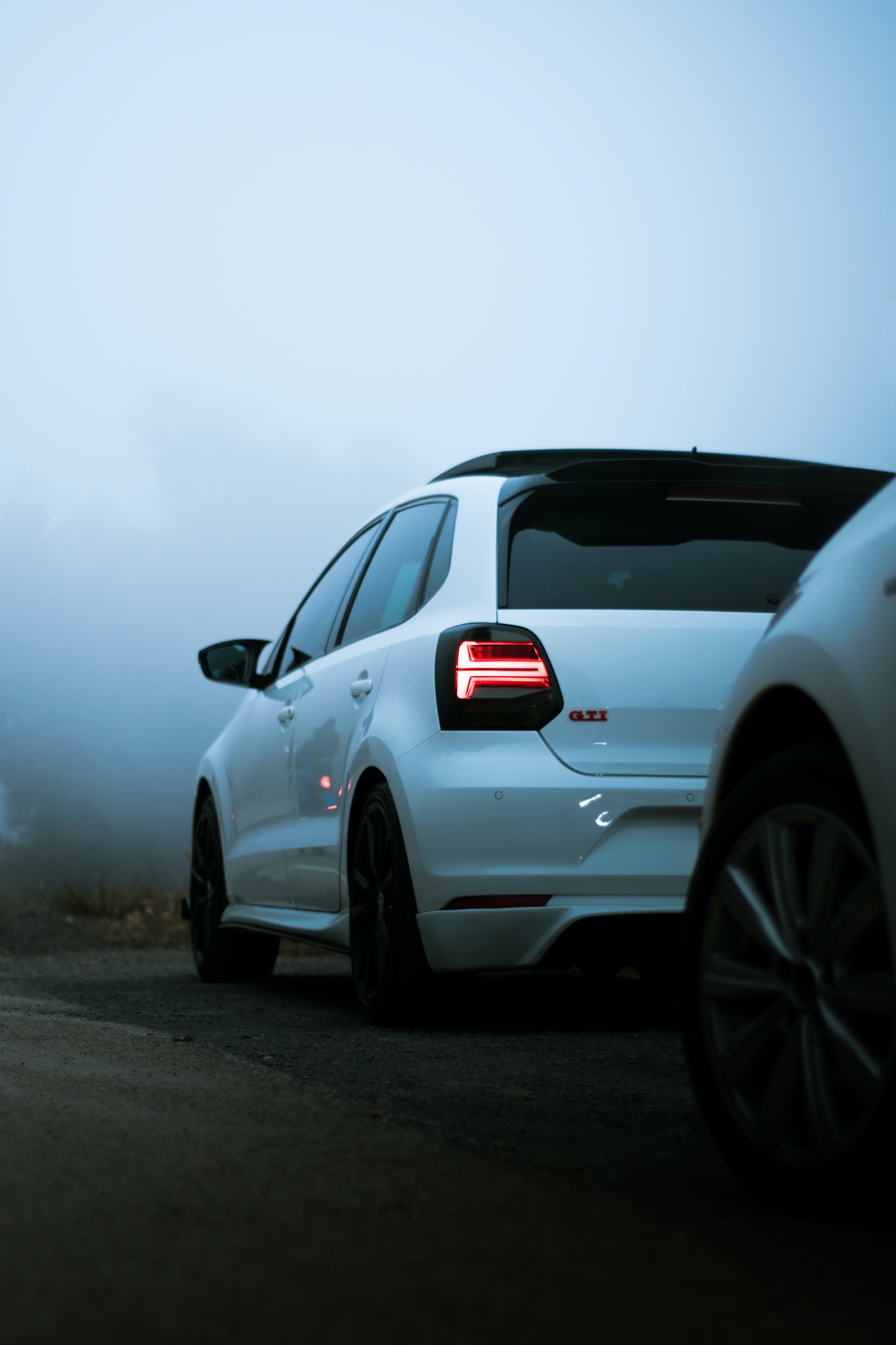 3340x5000 White Volkswagen Polo GTI on a Foggy, Phone